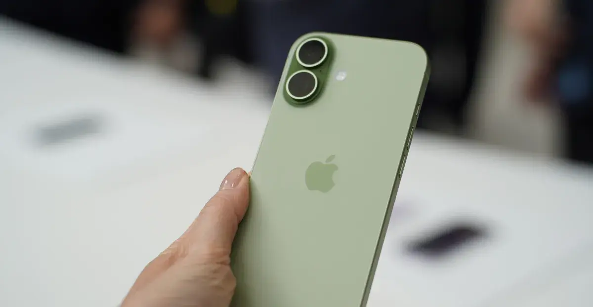 A photo of a person holding the iPhone 17.